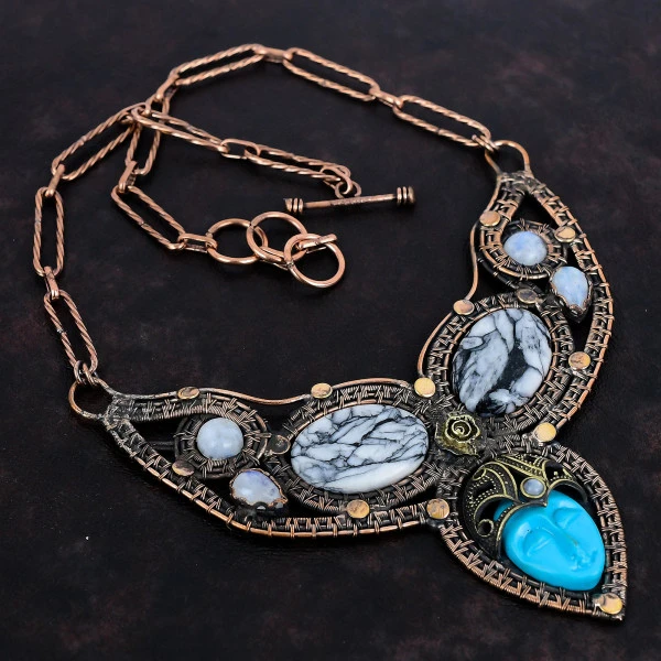 Blue Carved Bone Face Oval Blue Handmade Copper Wire Wrapped Necklace