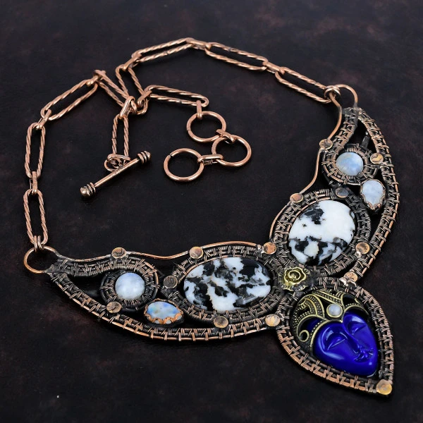 Blue Carved Bone Face Oval Blue Handmade Copper Wire Wrapped Necklace