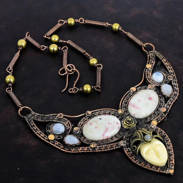 White Carved Bone Face Oval White Handmade Copper Wire Wrapped Necklace