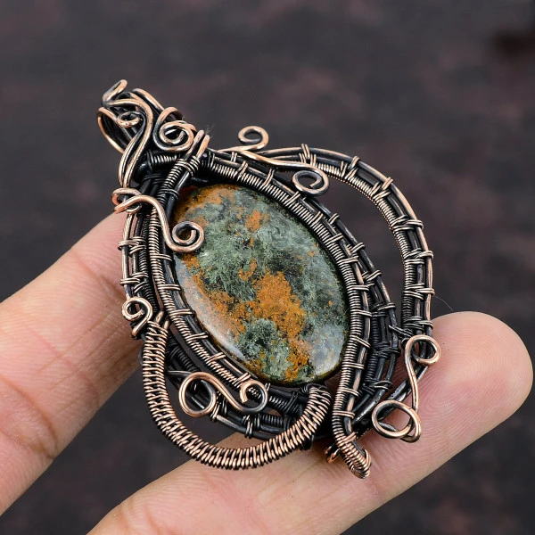 Spessartine Garnet in Limestone Oval Green Handmade Copper Wire Wrapped Pendant