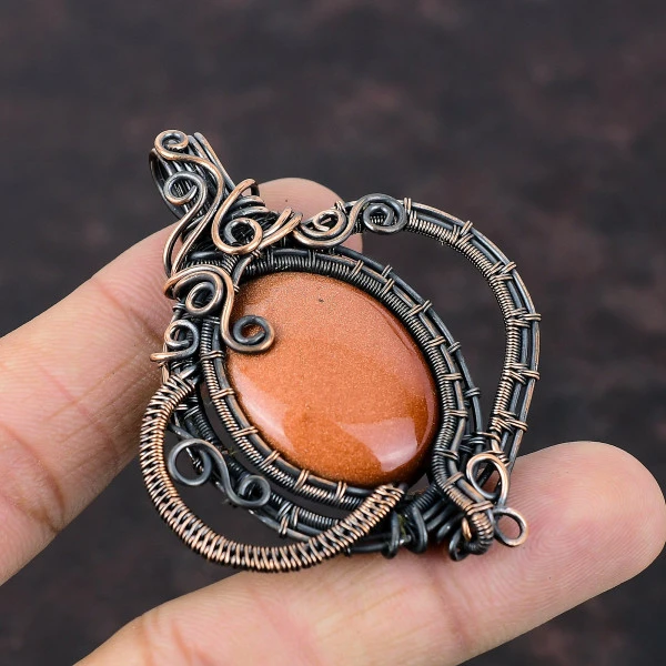 Sun Sitara Oval Orange Handmade Copper Wire Wrapped Pendant
