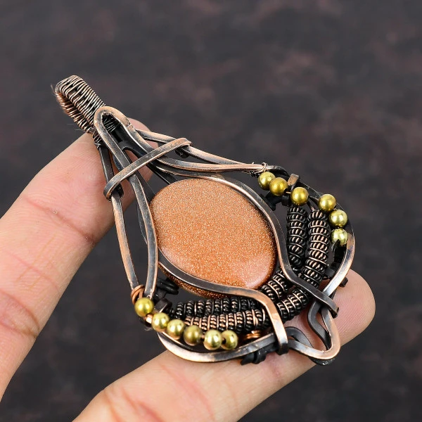 Sun Sitara Oval Orange Handmade Copper Wire Wrapped Pendant