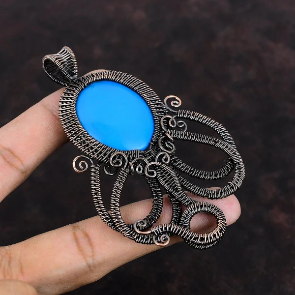 Sleeping Beauty Turquoise Oval Blue Handmade Copper Wire Wrapped Pendant