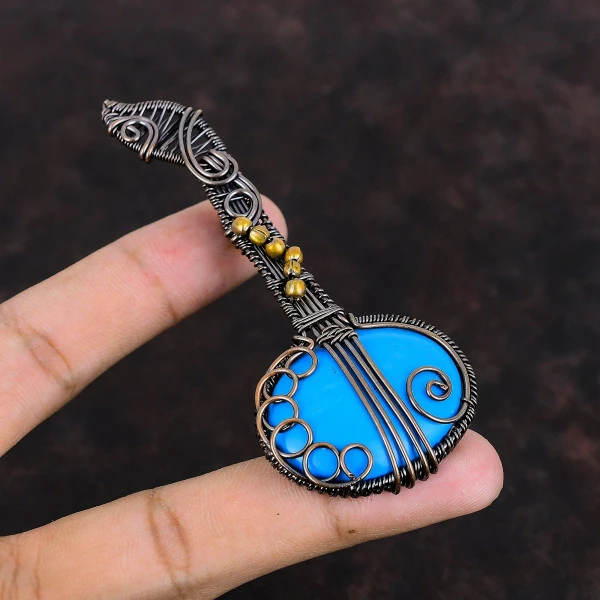 Sleeping Beauty Turquoise Oval Blue Handmade Copper Wire Wrapped Pendant