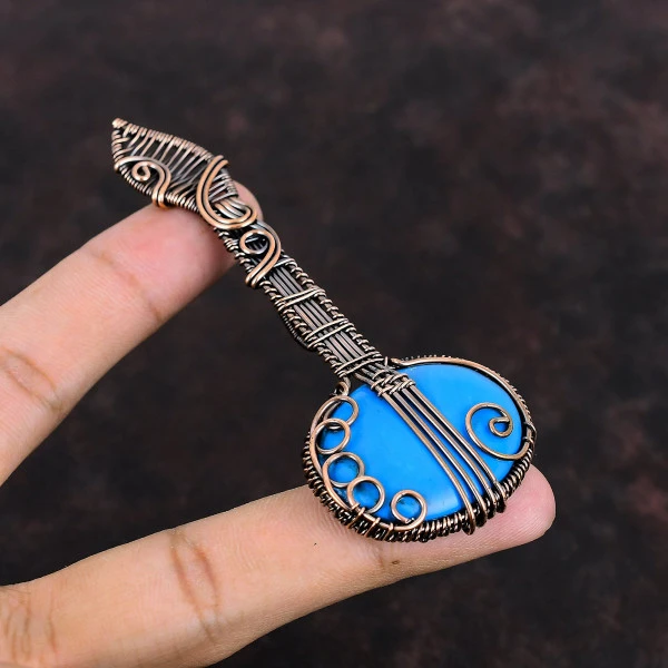 Sleeping Beauty Turquoise Oval Blue Handmade Copper Wire Wrapped Pendant