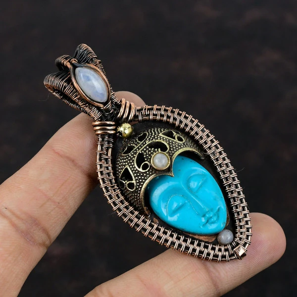 Blue Carved Bone Face Oval Blue Handmade Copper Wire Wrapped Pendant