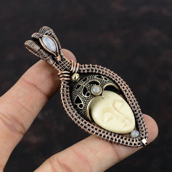 White Carved Bone Face Oval White Handmade Copper Wire Wrapped Pendant
