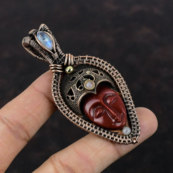 Red Carved Bone Face Oval Red Handmade Copper Wire Wrapped Pendant