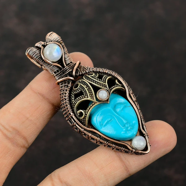 Blue Carved Bone Face Oval Blue Handmade Copper Wire Wrapped Pendant
