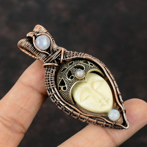 White Carved Bone Face Oval White Handmade Copper Wire Wrapped Pendant