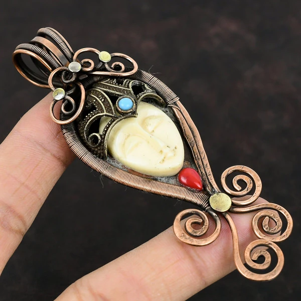White Carved Bone Face Oval White Handmade Copper Wire Wrapped Pendant