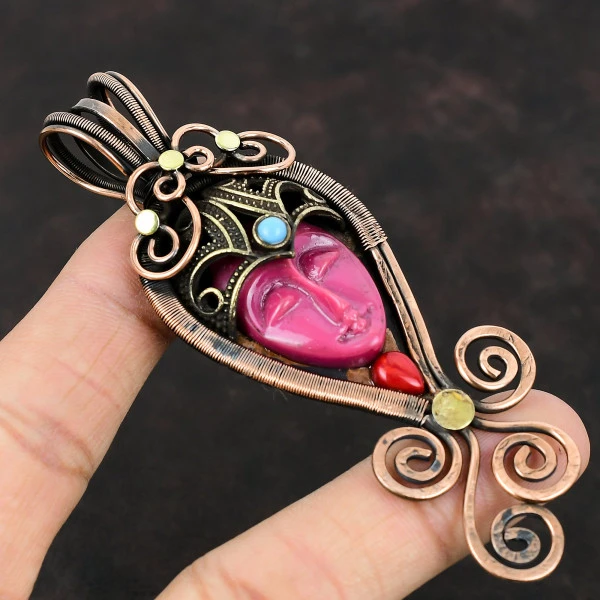 Pink Carved Bone Face Oval Pink Handmade Copper Wire Wrapped Pendant