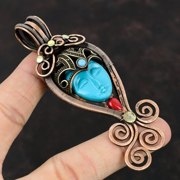 Blue Carved Bone Face Oval Blue Handmade Copper Wire Wrapped Pendant