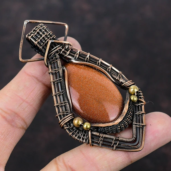 Sun Sitara Oval Orange Handmade Copper Wire Wrapped Pendant