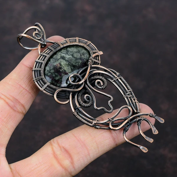 Eudialyte Oval Black Handmade Copper Wire Wrapped Pendant