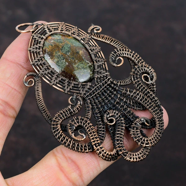 Spessartine Garnet in Limestone Oval Brown Handmade Copper Wire Wrapped Pendant