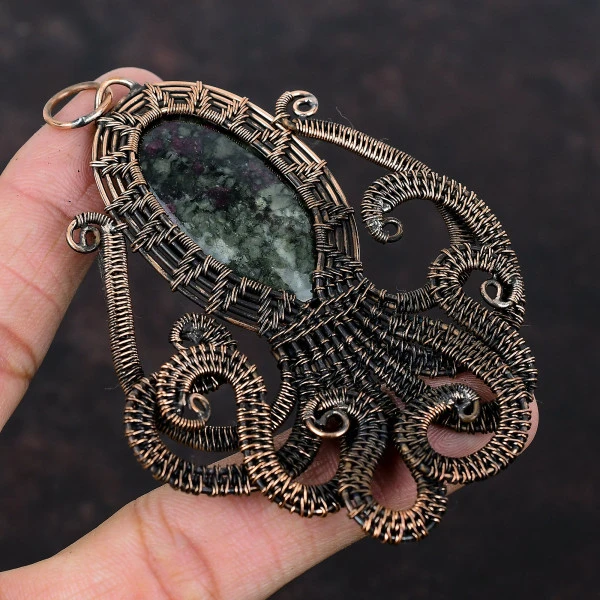 Eudialyte Oval Black Handmade Copper Wire Wrapped Pendant