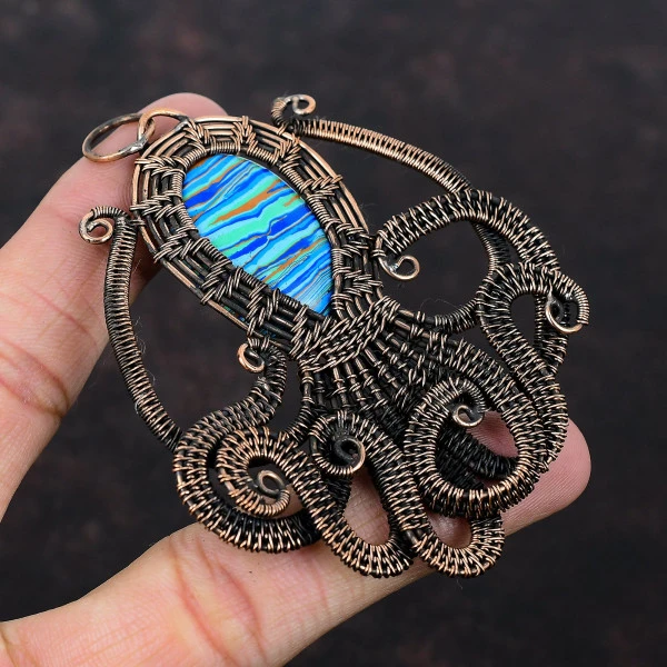 Rainbow Calsilica Oval Blue Handmade Copper Wire Wrapped Pendant