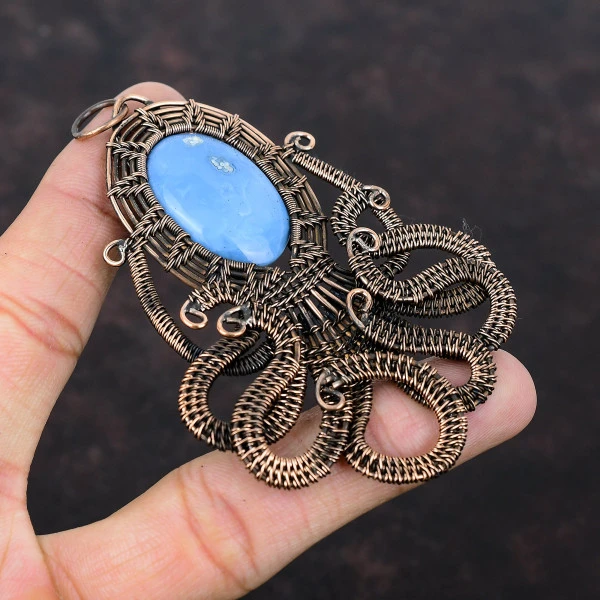 Owyhee Blue Opal Oval Blue Handmade Copper Wire Wrapped Pendant