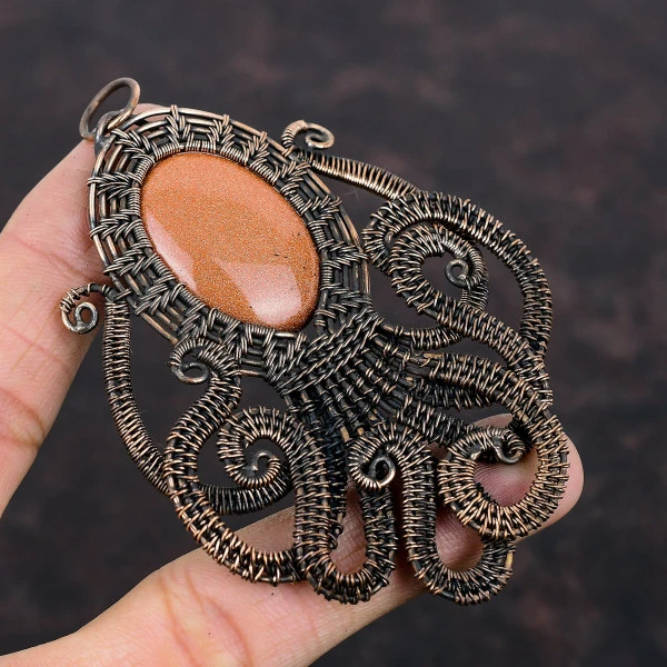 Sun Sitara Oval Orange Handmade Copper Wire Wrapped Pendant