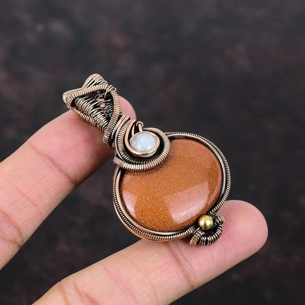 Sun Sitara Oval Orange Handmade Copper Wire Wrapped Pendant