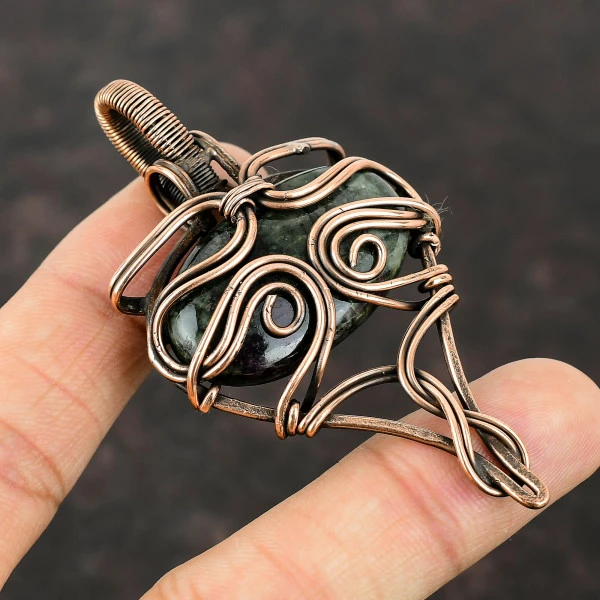 Eudialyte Oval Black Handmade Copper Wire Wrapped Pendant
