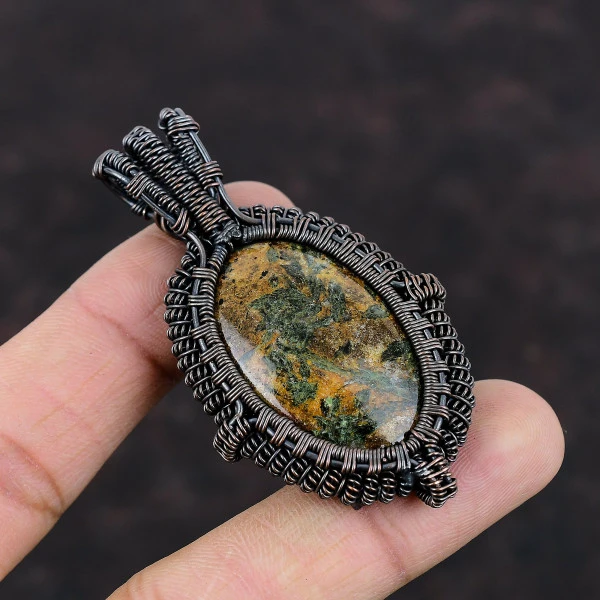 Spessartine Garnet in Limestone Oval Brown Handmade Copper Wire Wrapped Pendant