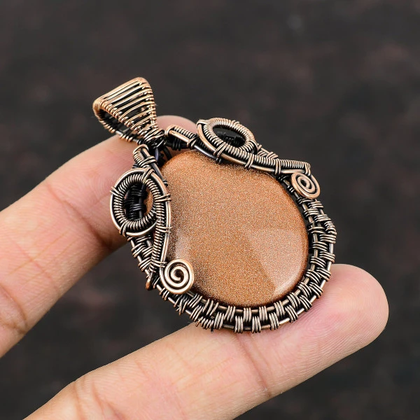 Sun Sitara Oval Orange Handmade Copper Wire Wrapped Pendant