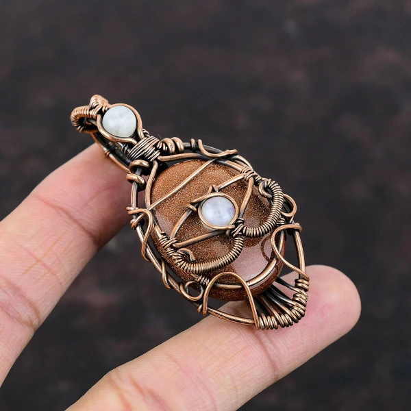 Sun Sitara Oval Orange Handmade Copper Wire Wrapped Pendant