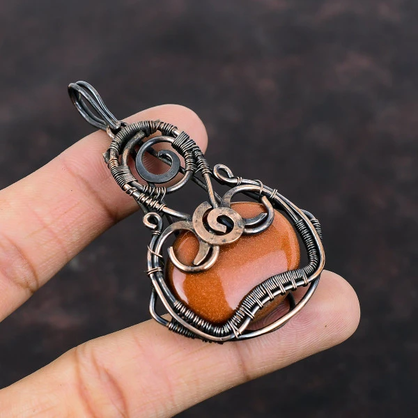 Sun Sitara Oval Orange Handmade Copper Wire Wrapped Pendant