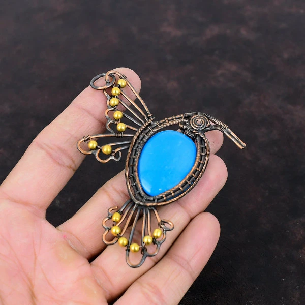 Sleeping Beauty Turquoise Oval Blue Handmade Copper Wire Wrapped Pendant