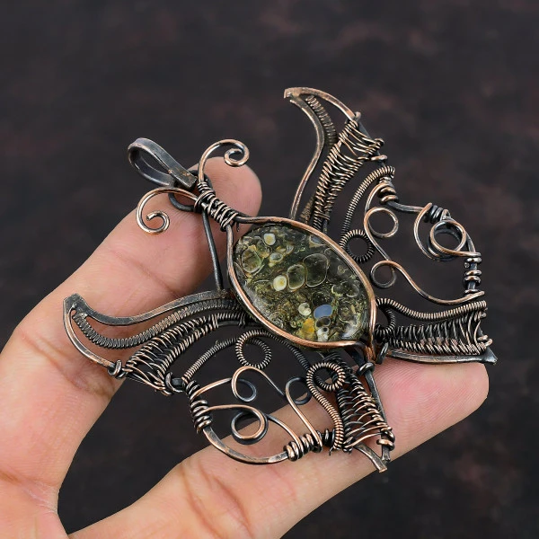 Turritella Agate Oval Black Handmade Copper Wire Wrapped Pendant