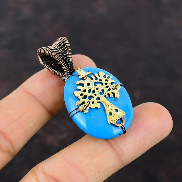 Sleeping Beauty Turquoise Oval Blue Handmade Copper Wire Wrapped Pendant
