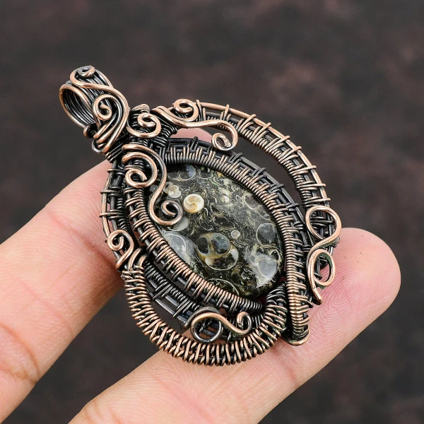 Turritella Agate Oval Black Handmade Copper Wire Wrapped Pendant